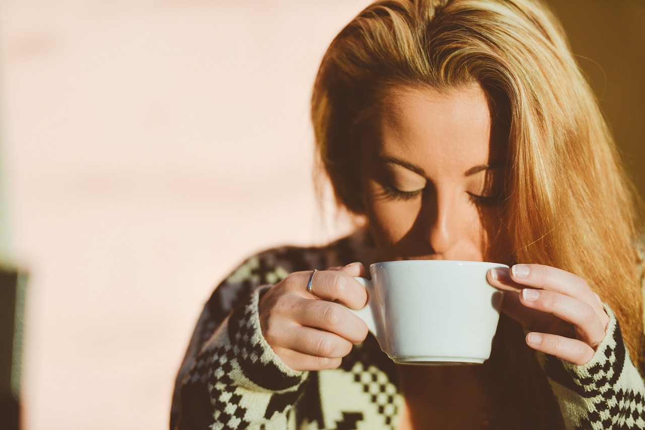 Woman taking a coffee break