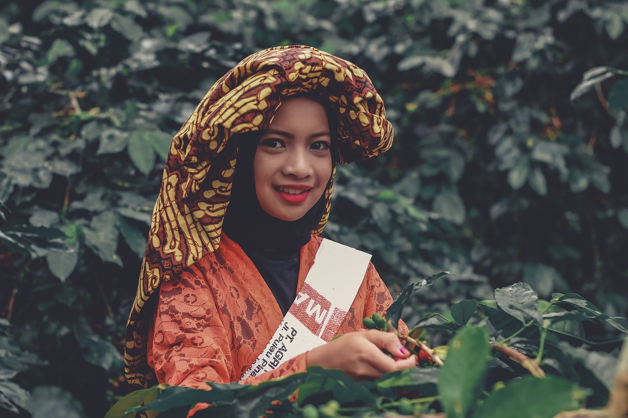 Woman harvesting coffee