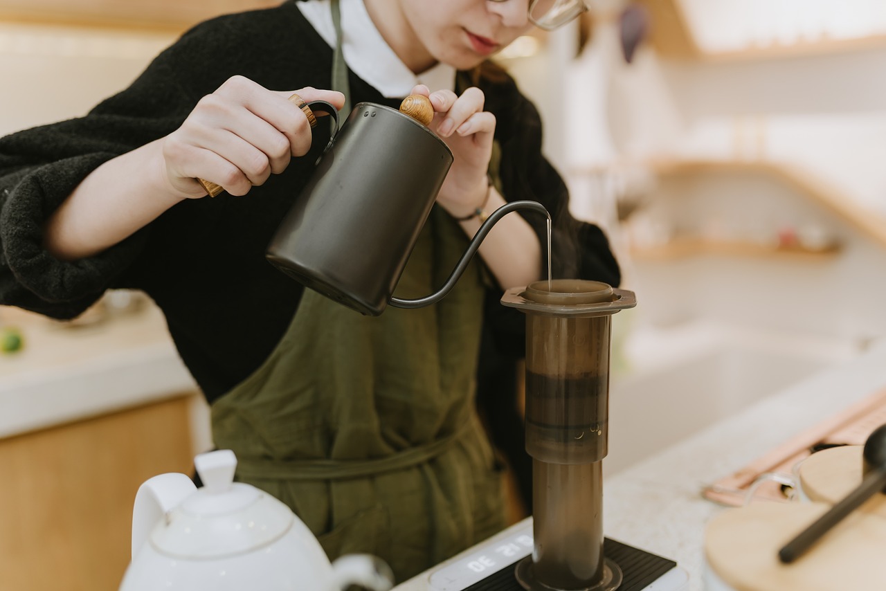 Woman preparing coffee